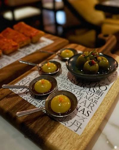 The Bazaar signature dishes Croquetas De Pollo
Cotton Candy Foie Gras
Olives Ferran Adria